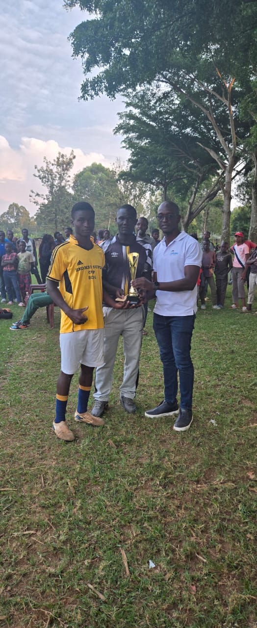 Jixels Technologies presenting a trophy during community sports support