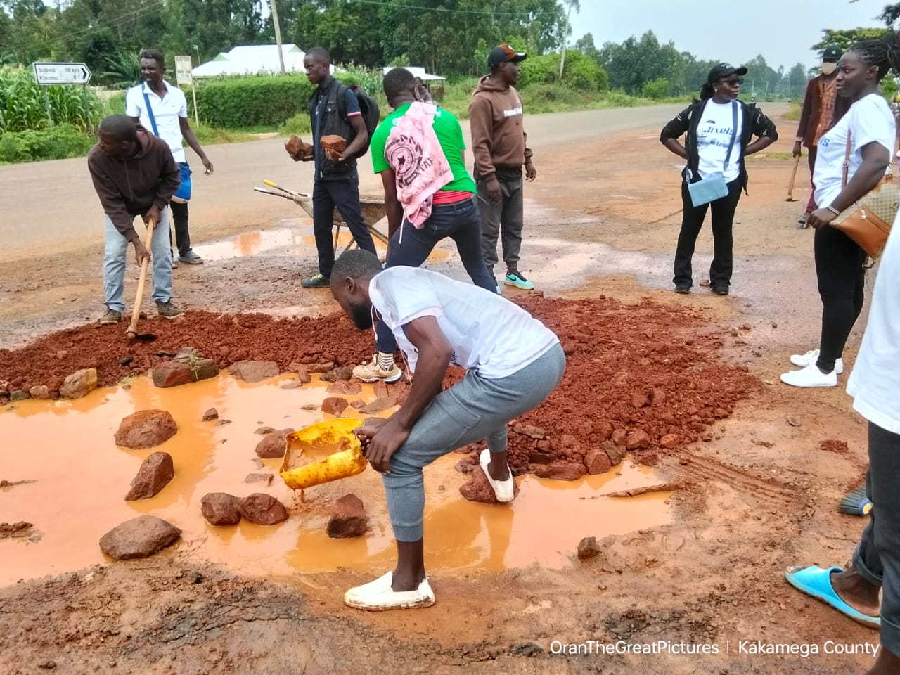 Jixels Technologies team supporting community road repair work