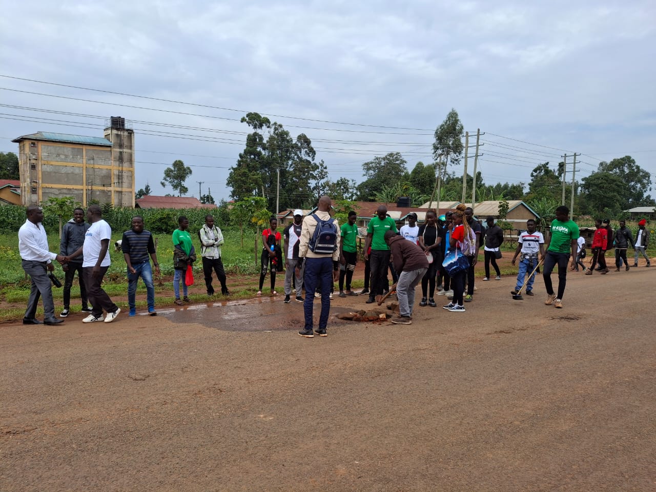 Jixels Technologies community road repair activity with local residents